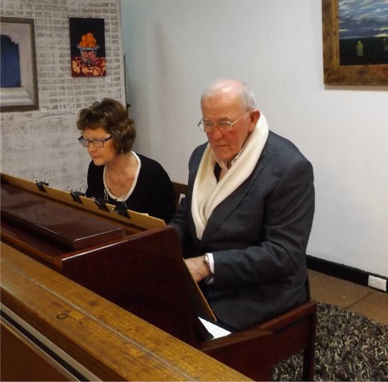 Robyn Rhodes and Peter Gorman at the piano delighting attendees